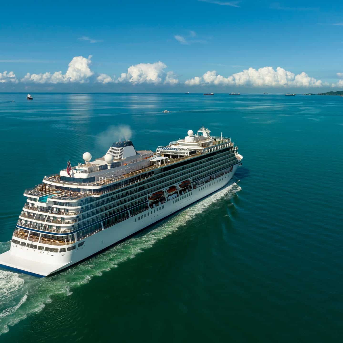 large luxury and high-class white cruise ship viking norway sailing in the ocean of thailand, travel to travel relax and spa healthy concept,
